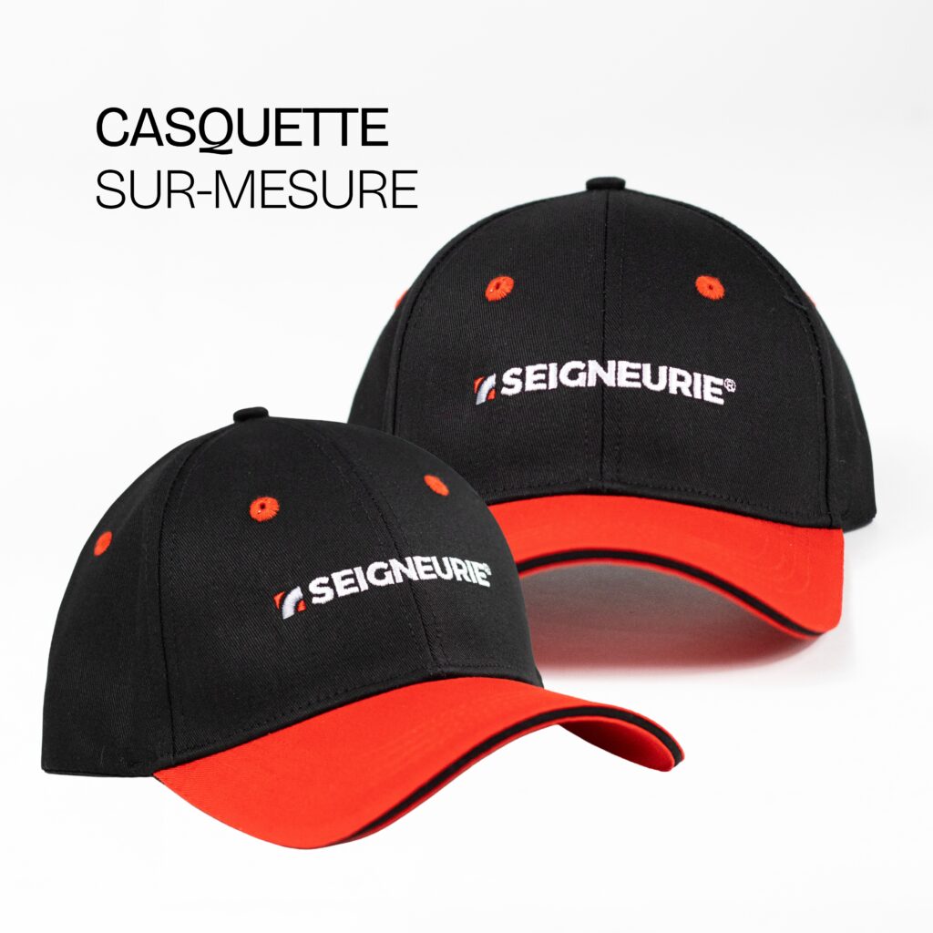 Casquette noire et rouge sur-mesure avec logo Seigneurie brodé, visière contrastée et finition premium.