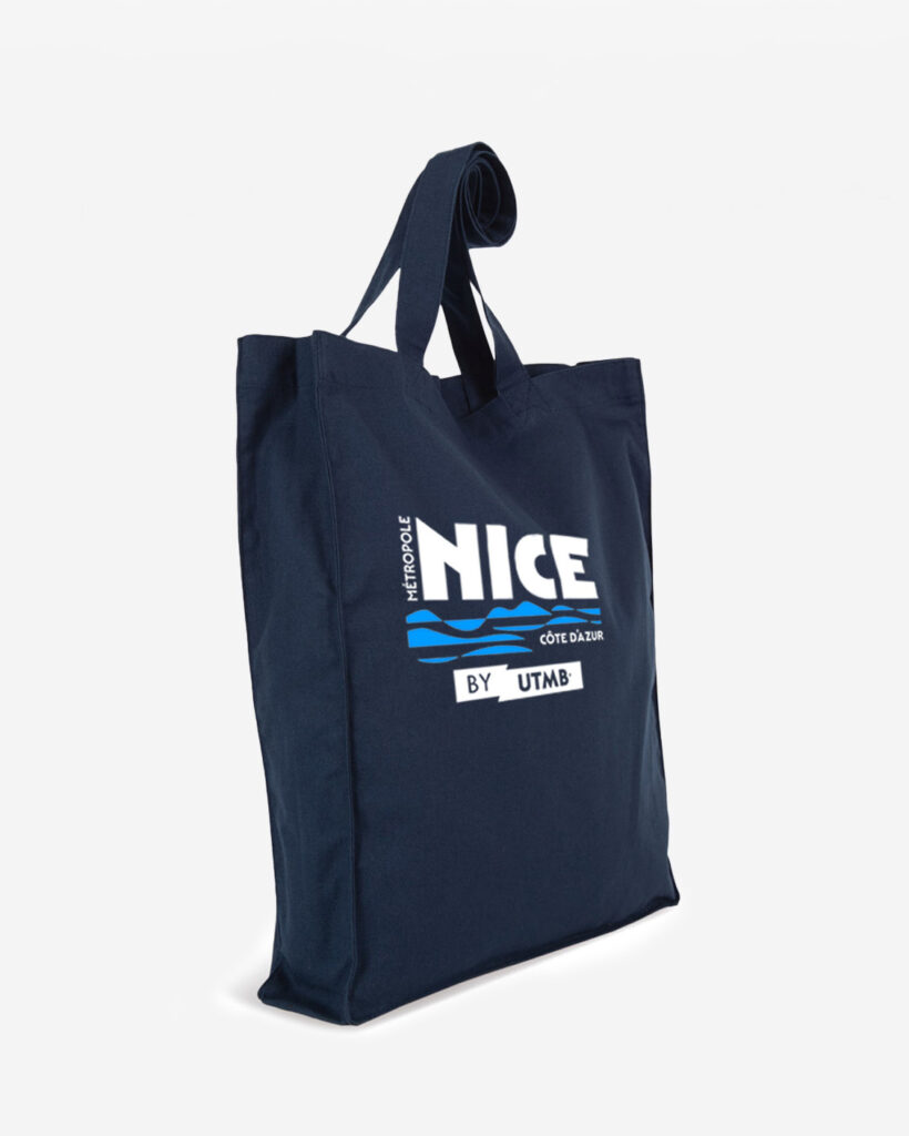 Tote bag personnalisé bleu marine Métropole Nice Côte d’Azur by UTMB, sac en coton publicitaire imprimé pour événement sportif.